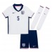 Camiseta Inglaterra John Stones #5 Primera Equipación para niños Eurocopa 2024 manga corta (+ pantalones cortos)